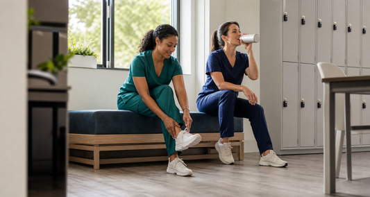 Healthcare workers taking a brief hydration and stretching break during a long shift