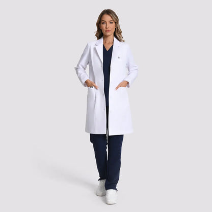 KungFu Scrubs women's long white lab coat full front view over navy scrubs